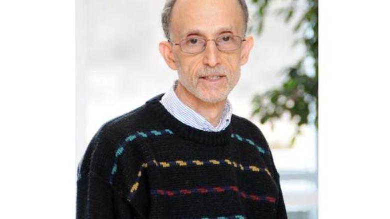 A headshot of Mark Gruskin